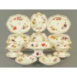 A part dinner service, 19th century, comprising two lidded tureens with stands, comport,