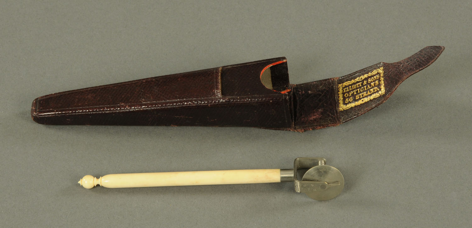 An opisometer, circa 1850, with turned ivory handle and ball knop terminal,