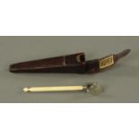 An opisometer, circa 1850, with turned ivory handle and ball knop terminal,