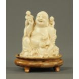 A Chinese ivory Okimono of Hotei, circa 1920's, finely carved,