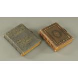 Two Victorian leather bound photograph albums, each with metal clasp.