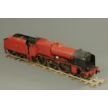 A 5" gauge live steam locomotive with tender "Royal Engineer" LMS 6109, black and red livery.