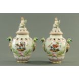 A pair of Berlin porcelain pot pourri vases and covers, late 19th/early 20th century,