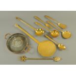 A quantity of brass skims, ladle, toasting fork and pan lid.