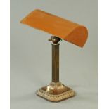 An Art Deco copper desk lamp. Height 32 cm.