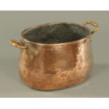 A copper two handled pot, 19th century,