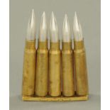 A Trench Art necessaire, early 20th century, formed from five bullets from a 303 rifle,