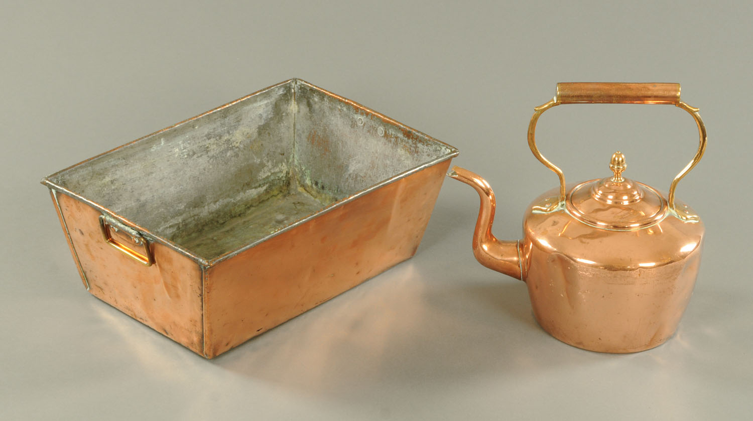 A copper rectangular planter, with brass handles, width 39.