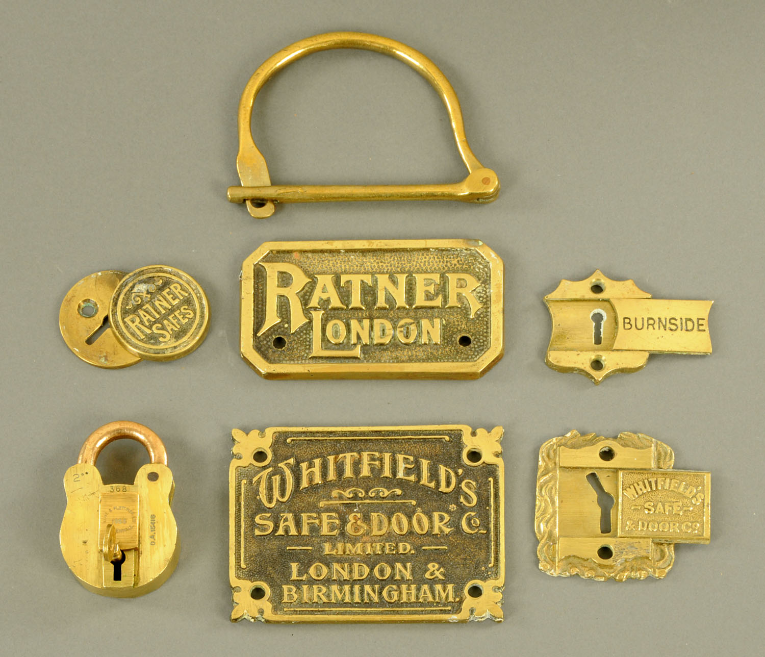 A brass padlock and key by Lowe & Fletcher Ltd.