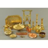A quantity of brass and copperware, including candlesticks, shell shaped bowl, etc.