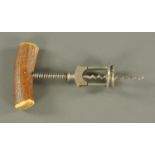 A Columbus type split frame corkscrew, late 19th/early 20th century, with stag antler handle,