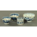 A Chinese porcelain cylindrical lidded box, and three tea bowls, largest diameter 11 cm.