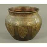 A large 19th century Chinese bronze jardiniere. Diameter +/- 38 cm (see illustration).