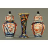 A pair of Imari lidded vases, and a Corona Ware vase. Tallest 22 cm.