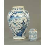 An 18th century English Delft jar, in the Chinoiserie style, and a smaller Delft jar.