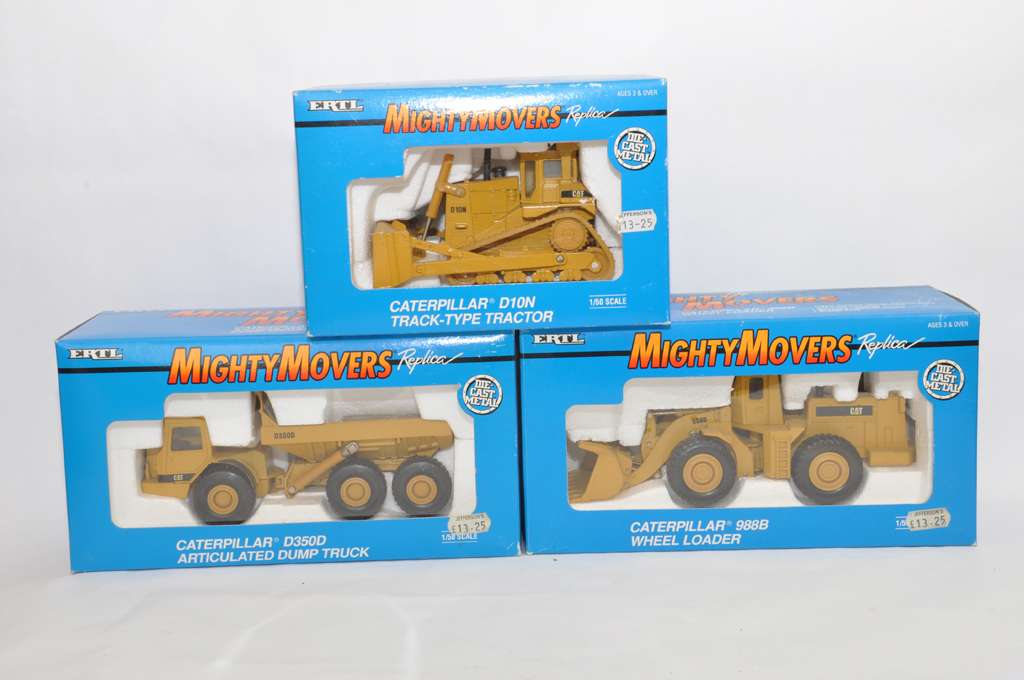 Ertl Might Movers 1/50 construction diecast including CAT Bulldozer, Wheel Loader and Dumper. NM