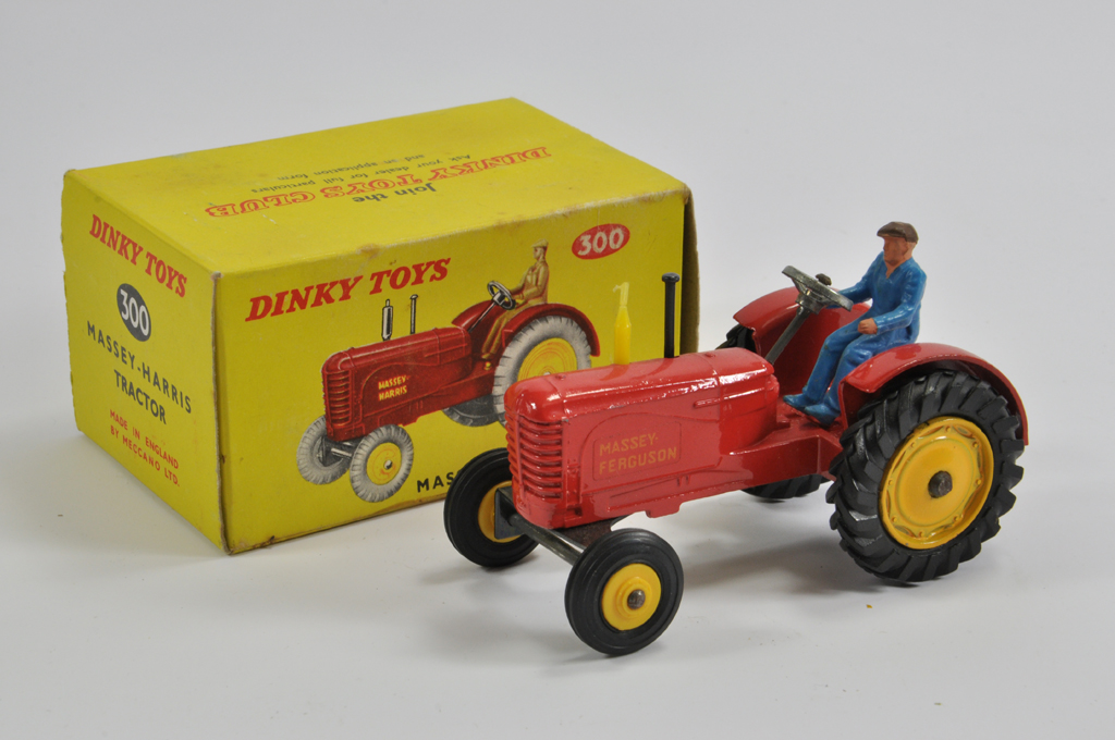 Dinky Toys No. 300 Massey Harris Tractor. Fine Example is NM to M in E Original Box.