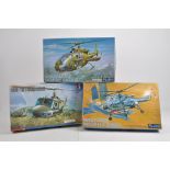 Trio of Plastic Model Kits to include Fujimi x 2 and one other. Helicopters of a Military Theme.