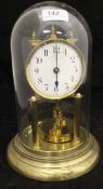 A 20th Century 365 day brass cased mantle clock under glass dome,