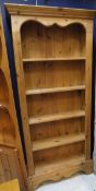 A 20th Century pine open bookcase of five shelves,