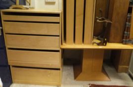 A collection of furniture comprising a modern oak corner cupboard with two doors enclosing DVD and