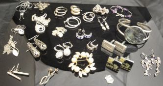 A box containing assorted silver and other jewellery to include bangle, earrings, cufflinks,