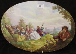 A 19th Century Continental painted pottery oval wall plaque depicting a hawking party