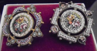 A pair of micro-mosaic brooches with central floral sprays