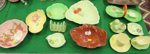 A collection of approximately 18 pieces of Carlton ware, mainly leaf pattern,