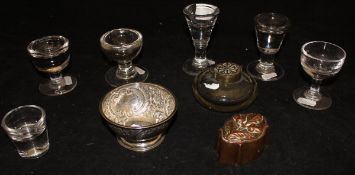 A collection of six 19th Century penny lick / illusion glasses,