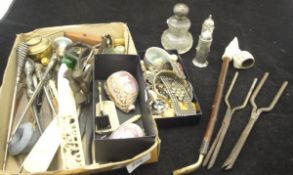 A box containing a silver mounted cut glass dressing table bottle of waisted form,