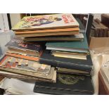 A box of various plans for pubs in the local vicinity and a shelf of books to include TOLKIEN,