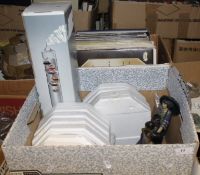 A box containing assorted collector's plates, figurines and a Gallileo thermometer,