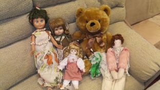 A box of unmarked Bisque headed dolls and brush teddy bears