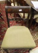 A set of six (4 + 2) Regency mahogany dining chairs with light sage green plush upholstered seats