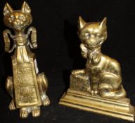 A brass door porter with ribboned cats decoration inscribed "East West Hames Best" together with