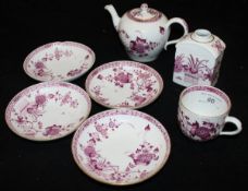 A Meissen part tea service with puce and gilt floral spray decoration on a ribbed body comprising