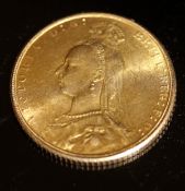 A Victorian sovereign dated 1891 CONDITION REPORTS It is in circulated condition.