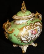 A Royal Crown Derby porcelain vase and cover decorated with gilt relief work and central floral