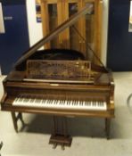 An early 20th Century rosewood cased baby grand piano,