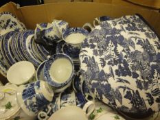 A box containing assorted Royal Worcester "Willow" pattern and other "Willow" pattern tea wares,