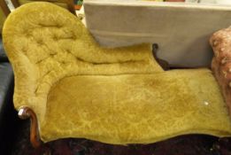 A Victorian mahogany framed chaise longue in mustard button back upholstery