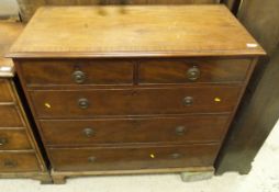 A circa 1900 mahogany and cross banded chest of two short and three long graduated drawers to