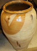 A Continental glazed pottery olive pot