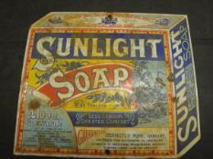 A reproduction Sunlight soap enamel advertising sign and a repro Colmans mustard enamel advertising