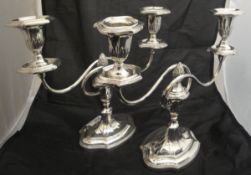 A pair of mid 20th Century silver twin branch candelabra (by Israel Freeman & Son Limited, London,