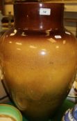 A Forrester of Burslem glazed pottery floor vase in green and brown fading glaze,