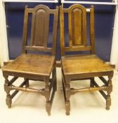 A pair of oak hall chairs