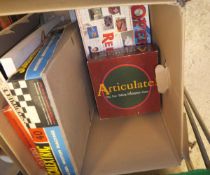 A box of various toys and games including "Scalextric Set 40-Blowout" boxed, Cluedo, Masterpiece,