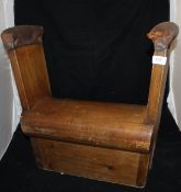 A vintage pine and leather embellished pommel horse